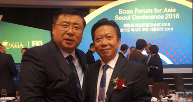 李勇董事长与国务院副秘书长孟扬亲切交谈并合影留念